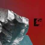 Red album cover with chipped black stone